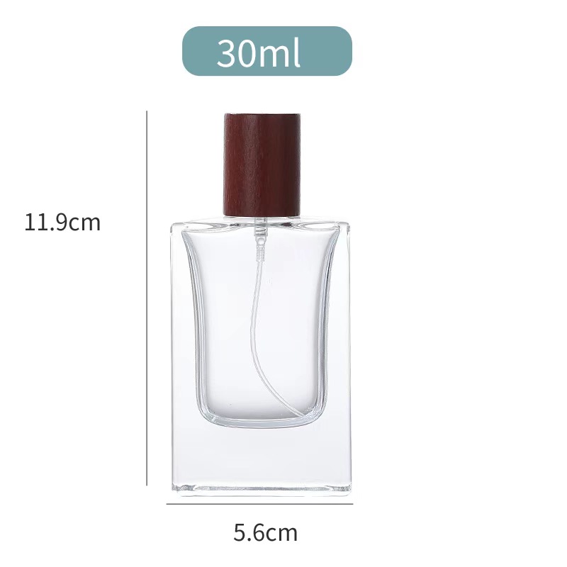 Flacone spruzzatore di profumo in vetro da 30 ml con tappo in legno diverso 